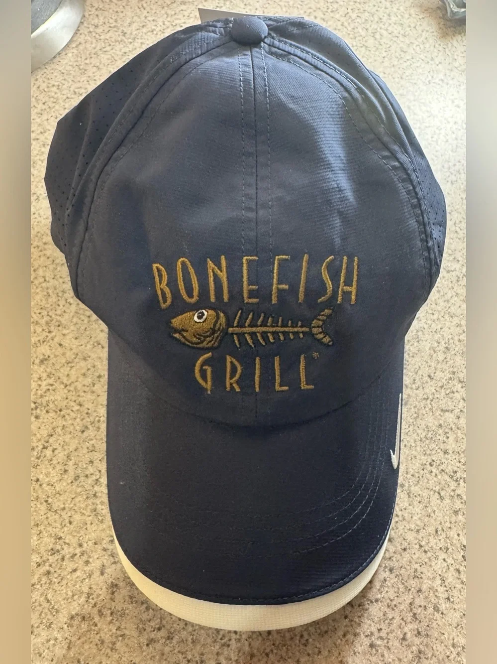 Nike GOLF Bonefish Grill dark blue baseball Hat cap with White Swoosh - NWT!!